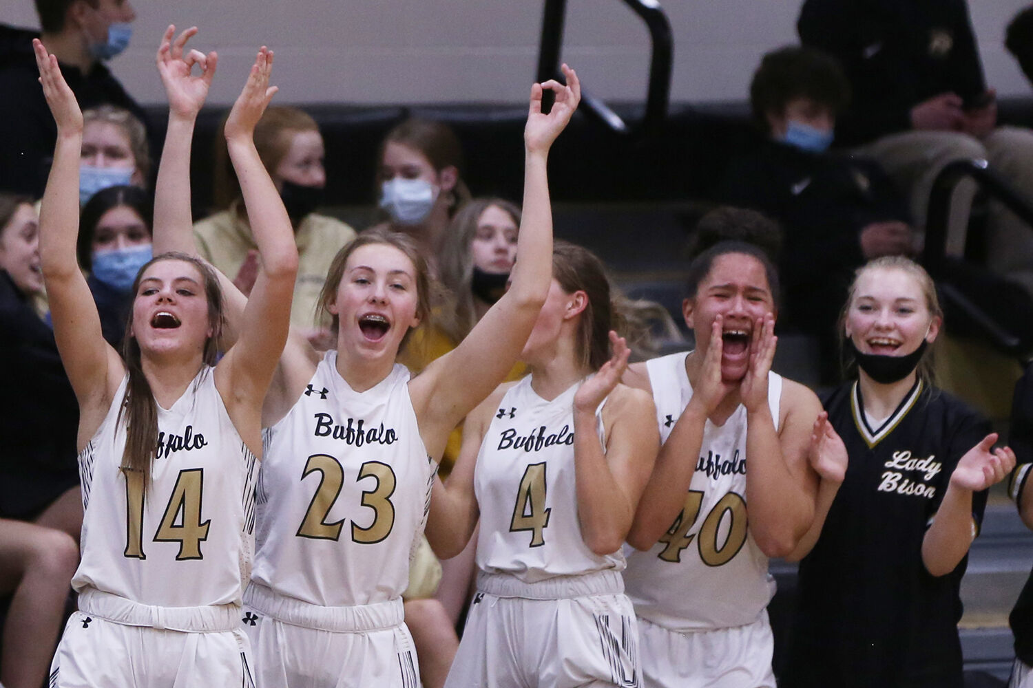 Buffalo’s bench cheers in excitement for a scored layup